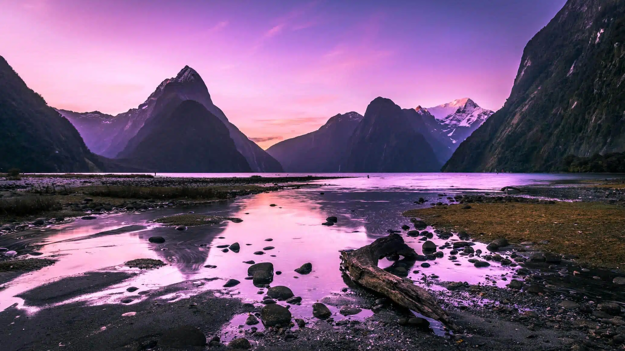 Fiordland remained largely inaccessible until the early twentieth century. Milford Sound was first explored by Europeans in the 1810s, but sustained tourism didn't begin until roads reached it in the 1930s and 1940s. The Milford Road was completed in 1954, which opened the landscape to regular visitors.
Doubtful Sound remained far more isolated. It was named by Captain Cook in 1770 (he was doubtful about whether the inlet could support a proper settlement) and saw minimal visitation until tourism infrastructure developed in recent decades. The first commercial cruises started in the 1990s, making it genuinely accessible.
Both fjords are results of extreme glaciation during ice ages, with glaciers carving U-shaped valleys to depths well below sea level. When sea levels rose after glaciation, the ocean flooded these valleys, creating fjords. The landscape is still actively changing, with waterfalls and rock falls reshaping the terrain regularly.