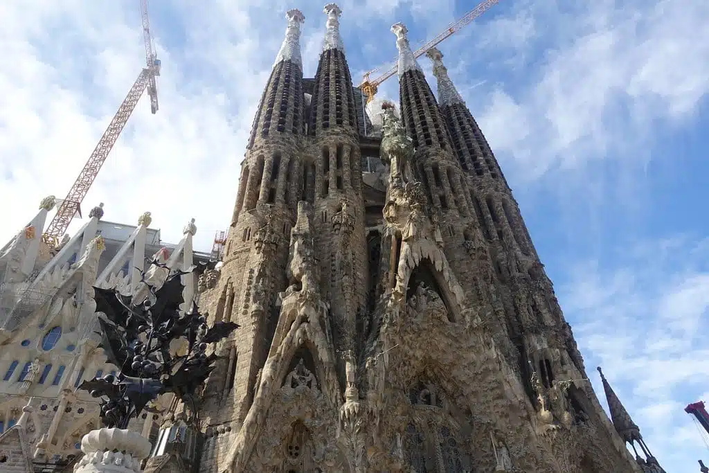Day Two focuses on Sagrada Família. This requires careful planning. Book tickets well in advance for early morning entry. The light in morning hours illuminates the interior in a way that afternoon cannot match. The stained glass shows its colours against natural light rather than artificial fluorescence.
Take the audio guide or book a small group tour. The building’s symbolism is complex, and a guide or audio explanation helps you understand what you are seeing structurally and spiritually. Allow at least two hours as a minimum.