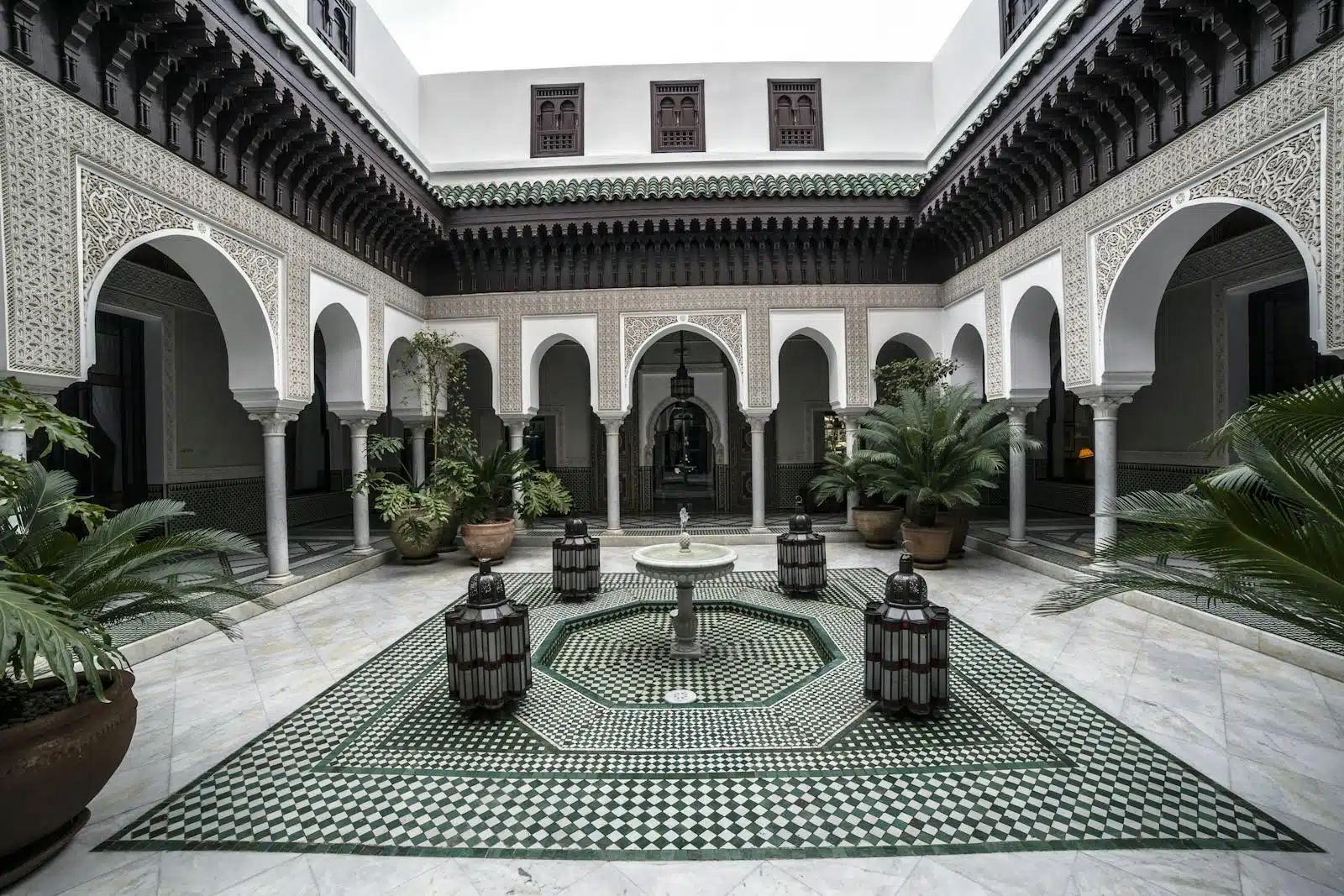 Explore this serene and intricately designed Moroccan courtyard in Marrakech.