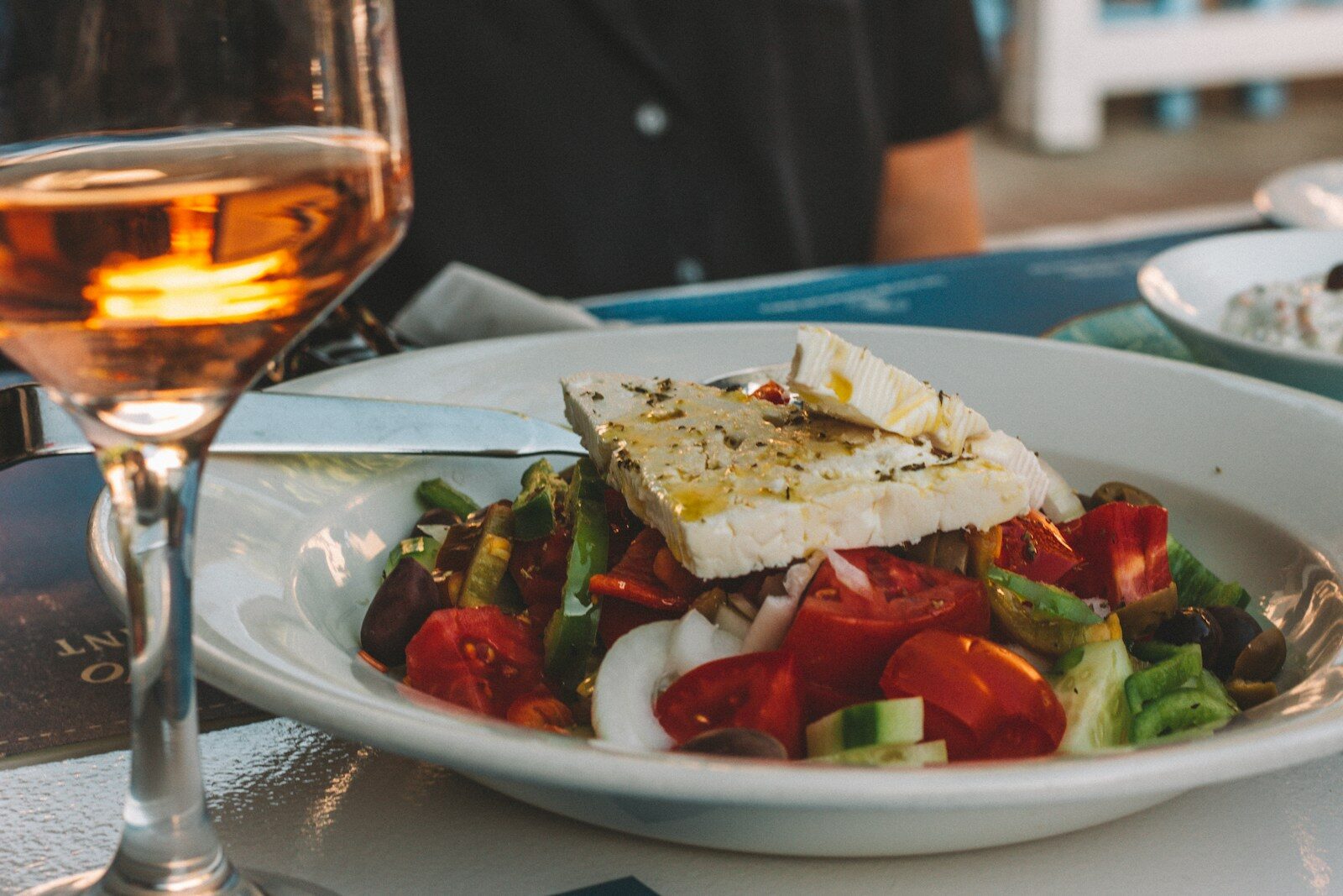 sliced tomato and cucumber on white ceramic plate