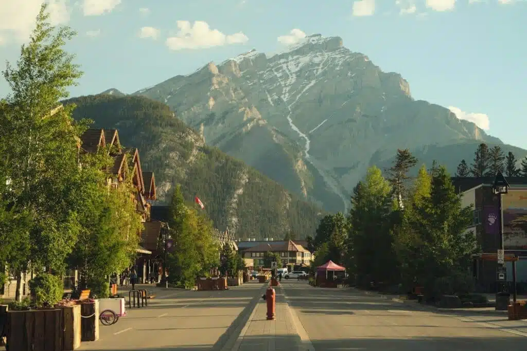 A street with a mountain in the background