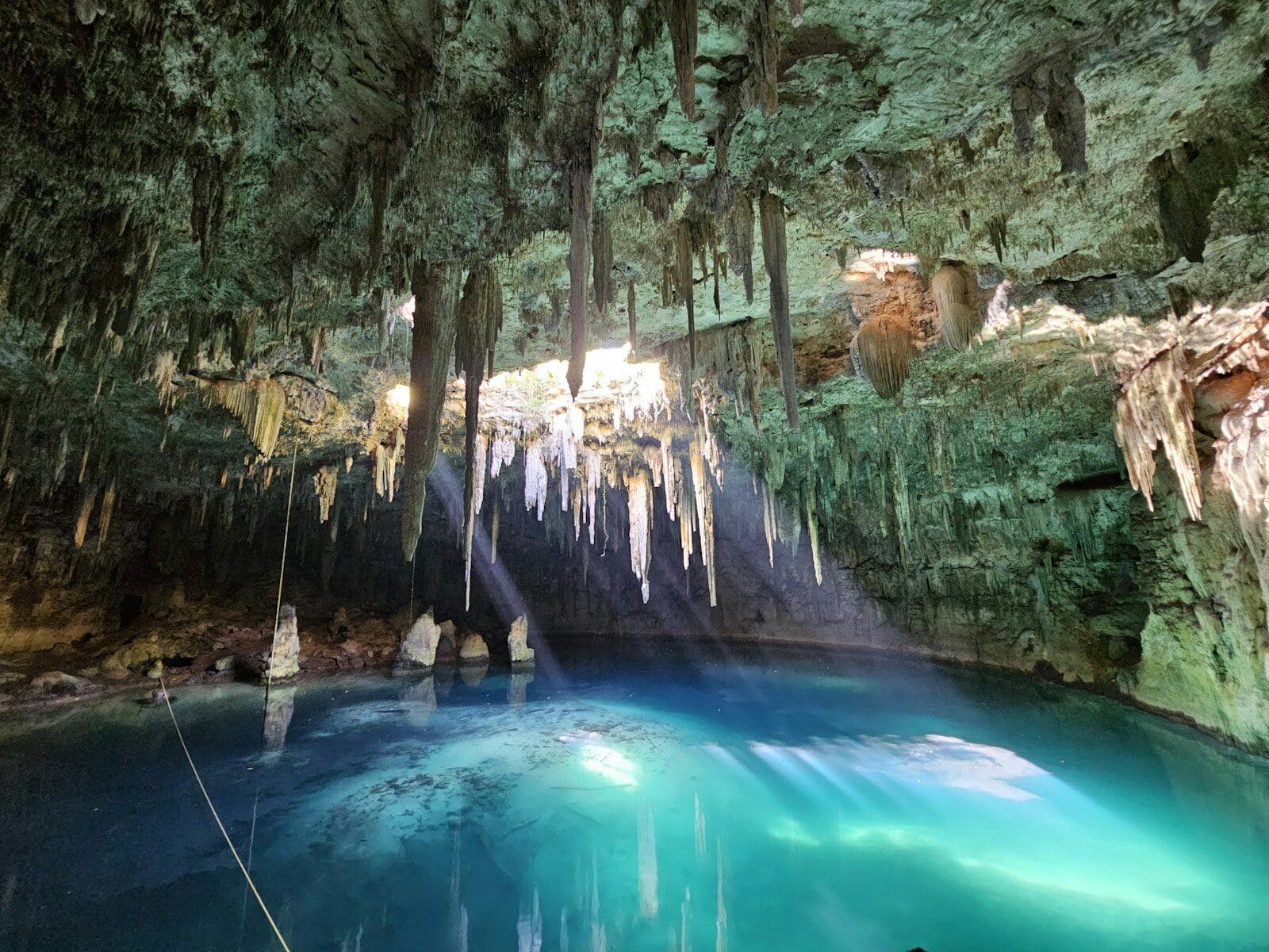 Private cenote swim in Tulum at sunrise