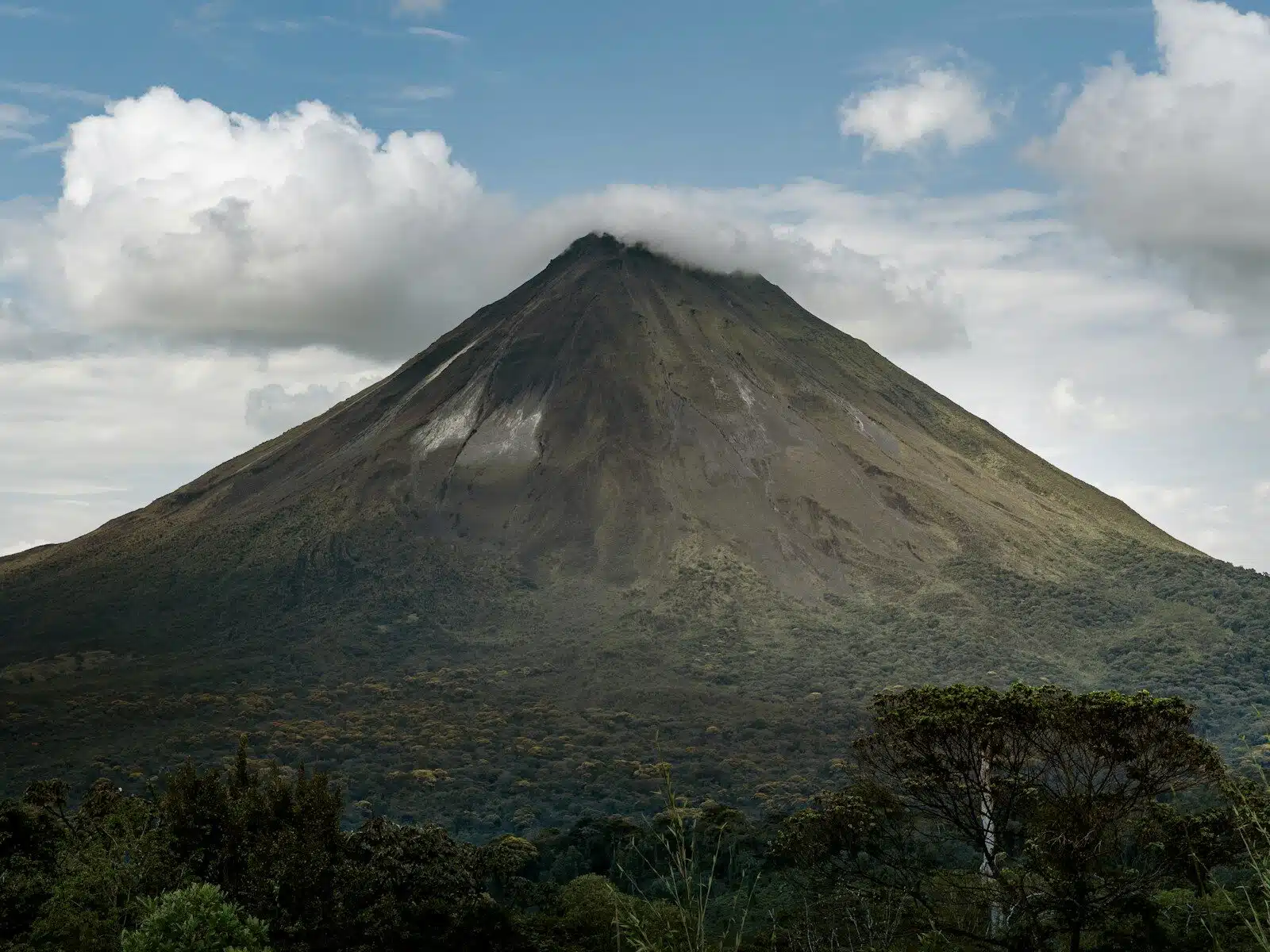 Arenal Volcano with trees below