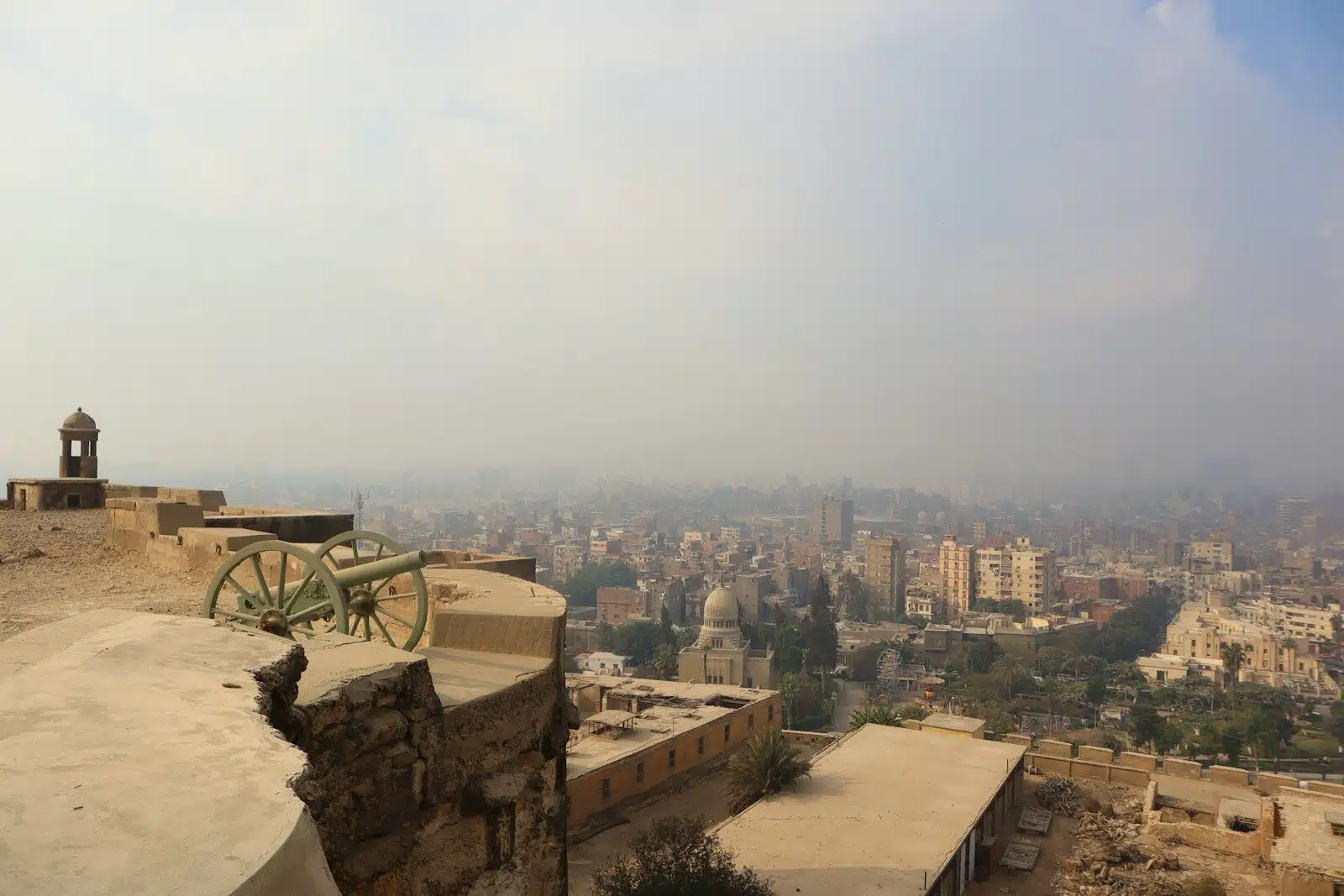 a view of a city from a hill top