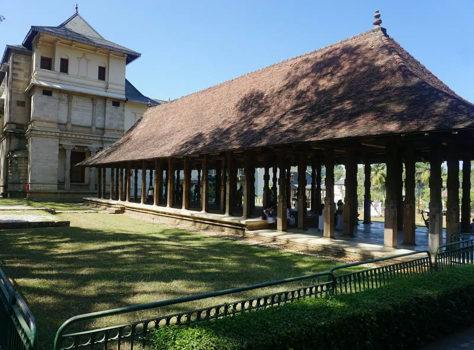 a building with a grass yard